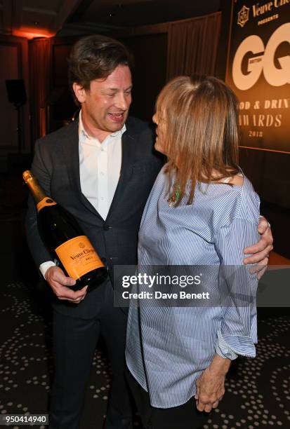 Jamie Oliver and Lady Ruth Rogers, winner of the Lifetime Achievement award, attend the GQ Food & Drink Awards at Rosewood London on April 23, 2018...