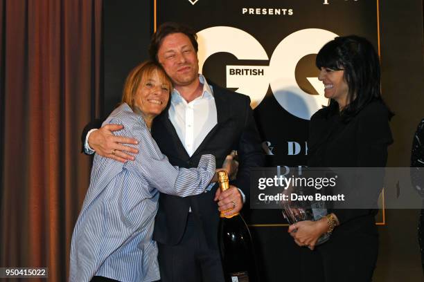 Lady Ruth Rogers, winner of the Lifetime Achievement award, Jamie Oliver and Claudia Winkleman attend the GQ Food & Drink Awards at Rosewood London...