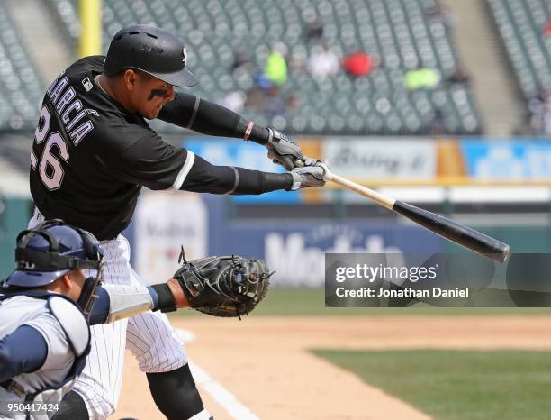 Avisail Garcia of the Chicago White Sox bats against the Tampa Bay Rays at Guaranteed Rate Field on April 11, 2018 in Chicago, Illinois. The White...