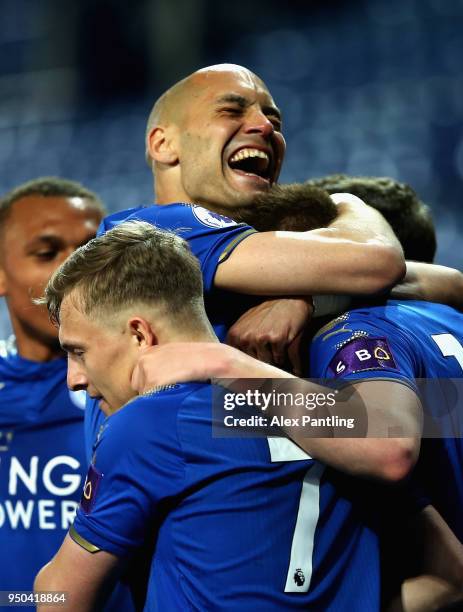 Yohan Benalouane of Leicester City celebrates with teammates after Harvey Barnes scores his sides second goal during the Premier league 2 match...