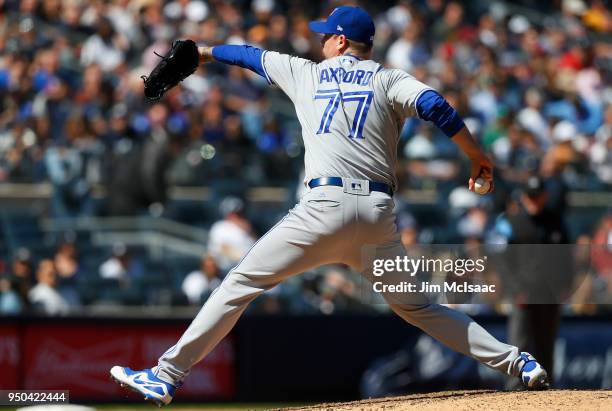 John Axford of the Toronto Blue Jays in action against the New York Yankees at Yankee Stadium on April 21, 2018 in the Bronx borough of New York...