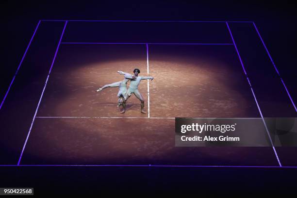 Dancers practice on the court during day 1 of the Porsche Tennis Grand Prix at Porsche-Arena on April 23, 2018 in Stuttgart, Germany.