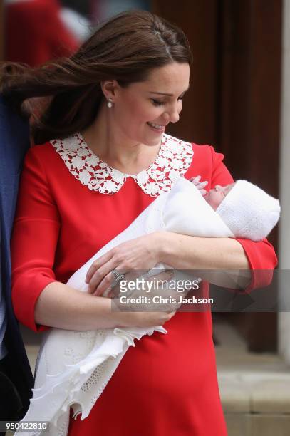 Prince William, Duke of Cambridge and Catherine, Duchess of Cambridge depart the Lindo Wing with their new born son Prince Louis of Cambridge at St...