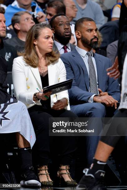 Assistant Coaches Becky Hammon and Ime Udoka of the San Antonio Spurs look on against the Golden State Warriors in Game Four of the Western...