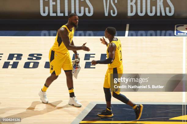 Lance Stephenson and Darren Collison of the Indiana Pacers react to a play against the Cleveland Cavaliers in Game Three of Round One of the 2018 NBA...