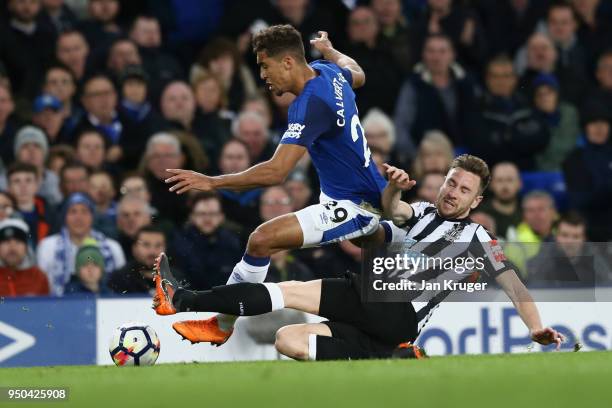 Dominic Calvert-Lewin of Everton and Paul Dummett of Newcastle United in action during the Premier League match between Everton and Newcastle United...