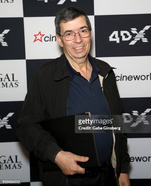 Cineworld Group CEO Mooky Greidinger poses after signing a partnership agreement deal with CJ 4DPlex at Caesars Palace during CinemaCon, the official...