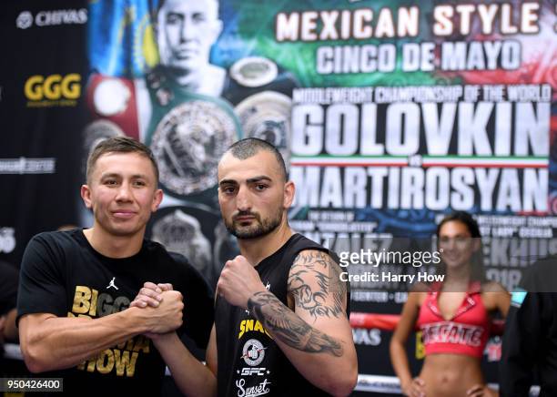 Vanes Martirosyan and Gennady Golovkin of Kazakhstan pose in the ring during a media workout at the Glendale Fighting Club on April 23, 2018 in...