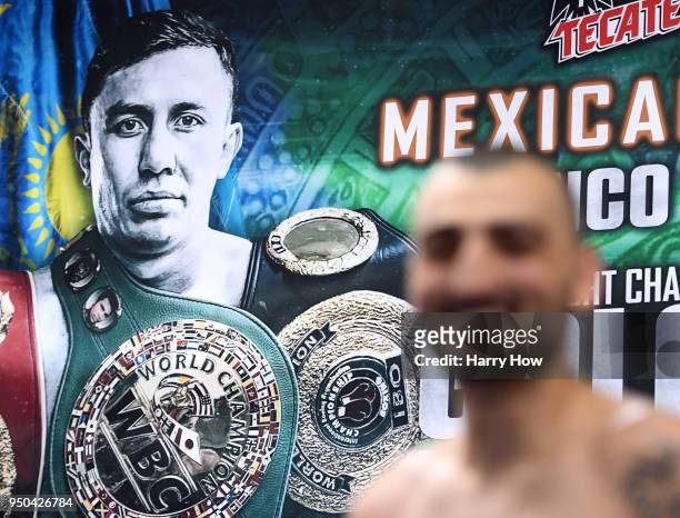 Vanes Martirosyan smiles in front of a picture of his opponent Gennady Golovkin of Kazakhstan while training for his middleweight fight during a...
