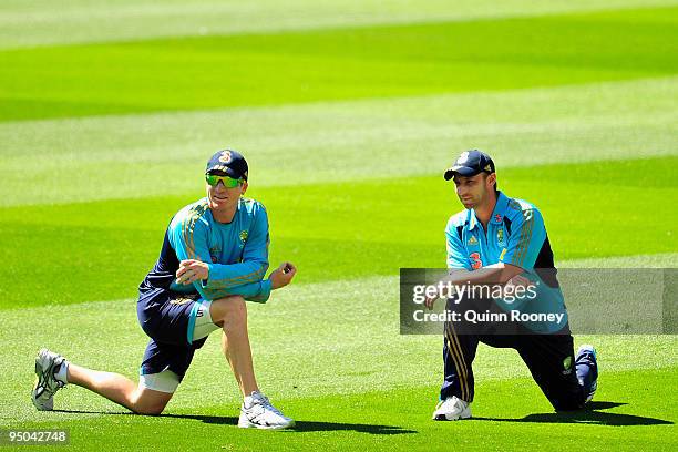 Brad Haddin and Phillip Hughes of Australia stretch during an Australian nets session at Melbourne Cricket Ground on December 23, 2009 in Melbourne,...