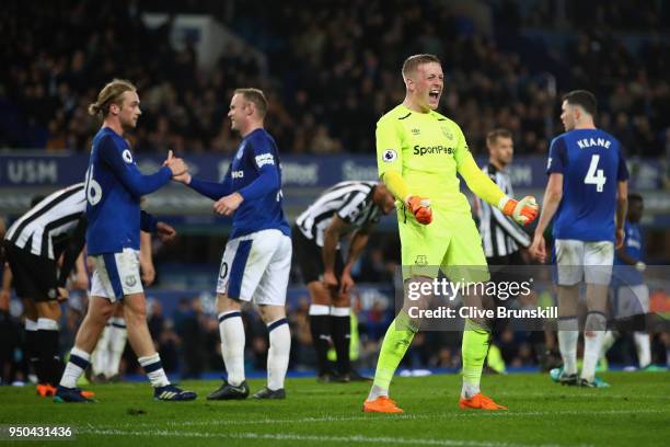Jordan Pickford of Everton celebrates after the Premier League match between Everton and Newcastle United at Goodison Park on April 23, 2018 in...