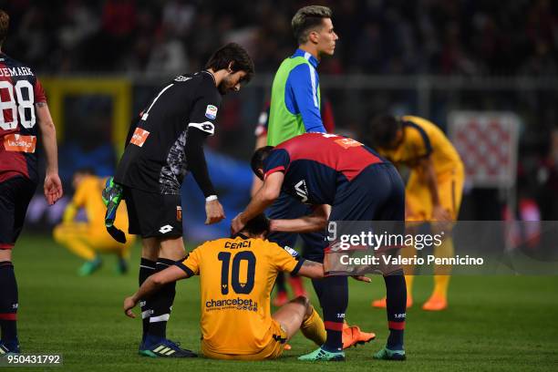 Goran Pandev and Mattia Perin of Genoa CFC console Alessio Cerci of Hellas Verona FC at the end of the Serie A match between Genoa CFC and Hellas...
