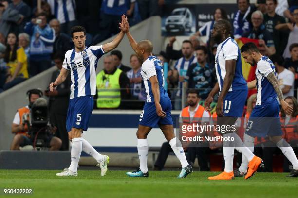 Porto's Spanish defender Ivan Marcano celebrates after scoring a goal during the Premier League 2016/17 match between FC Porto and Vitoria FC, at...