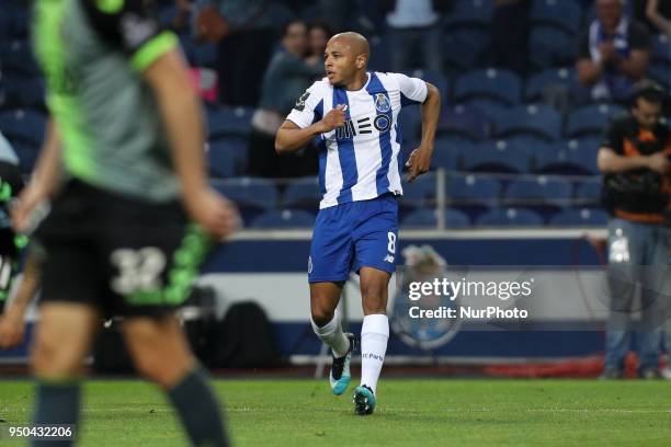 Porto's Algerian forward Yacine Brahimi celebrates after scoring a goal during the Premier League 2016/17 match between FC Porto and Vitoria FC, at...