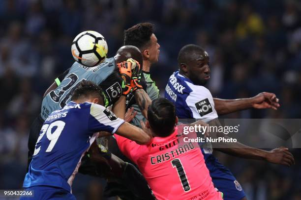 Porto's Malian forward Moussa Marega vies with Vitoria Setubal's Portuguese forward Edinho , Vitoria Setubal's Portuguese goalkeeper Cristiano...