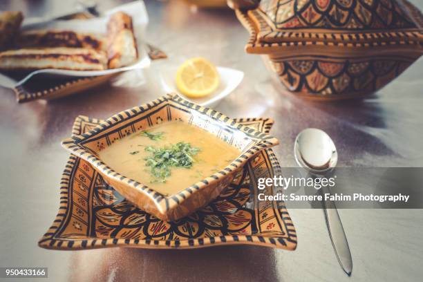 harira soup served on bowl with bourak (brik) - flat leaf parsley stock pictures, royalty-free photos & images