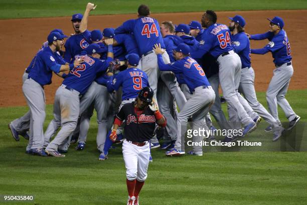 The Chicago Cubs celebrate winning the World Series at the end of Game 7 of the World Series between the Chicago Cubs and Cleveland Indians Thursday,...