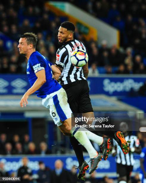 Jamaal Lascelles of Newcastle United wins a header over Phil Jagielka of Everton during the Premier League Match between Everton and Newcastle United...