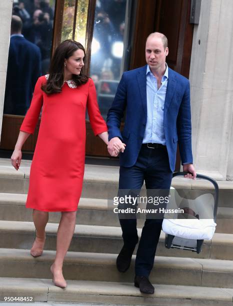 Prince William, Duke of Cambridge and Catherine, Duchess of Cambridge leave the Lindo Wing at St. Mary's Hospital with their newborn son Prince Louis...