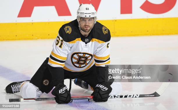 Rick Nash of the Boston Bruins stretches during warm-up prior to playing against the Toronto Maple Leafs in Game Six of the Eastern Conference First...