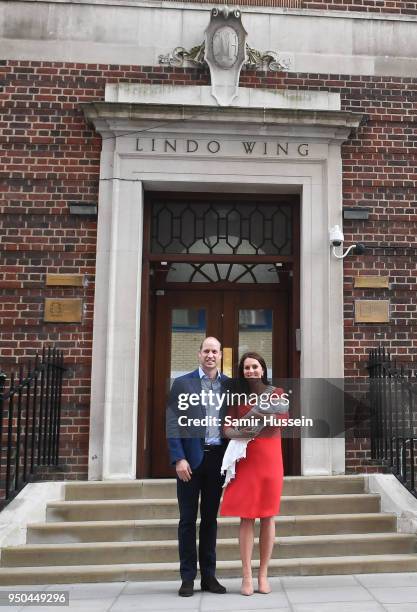 Catherine, Duchess of Cambridge and Prince William, Duke of Cambridge depart the Lindo Wing with their newborn son Prince Louis of Cambridge at St...