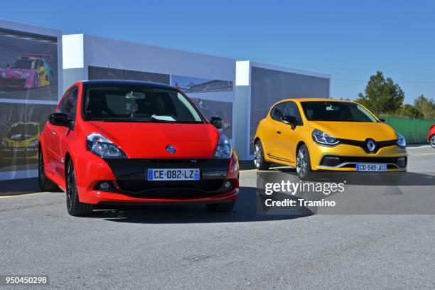 renault clio rs - two generations - old renault stock pictures, royalty-free photos & images