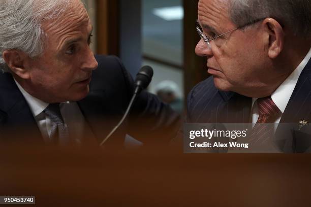 Sen. Bob Corker , chairman of the Senate Foreign Relations Committee, discusses with ranking member Sen. Bob Menendez prior to a committee meeting...