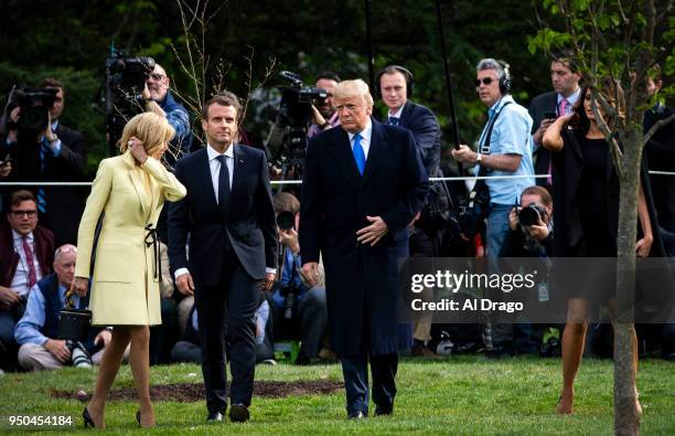 President Donald Trump, French President Emmanuel Macron, his wife Brigitte Macron and first lady Melania Trump depart for Mount Vernon, on the South...