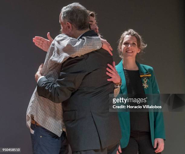 Portuguese singer and composer Luisa Sobral smiles while her brother Salvador Sobral is decorated by Portuguese President Marcelo Rebelo de Sousa...