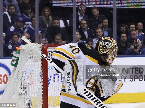 Boston Bruins goaltender Tuukka Rask makes a shoulder save as the Toronto Maple Leafs play the Boston Bruins in game six of their first round NHL...