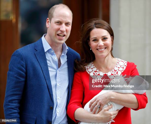 Prince William, Duke of Cambridge and Catherine, Duchess of Cambridge depart the Lindo Wing of St Mary's Hospital with their newborn baby son on...