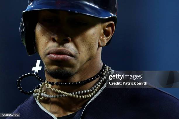 Francisco Lindor of the Cleveland Indians walks off of the field after popping out against the Baltimore Orioles at Oriole Park at Camden Yards on...