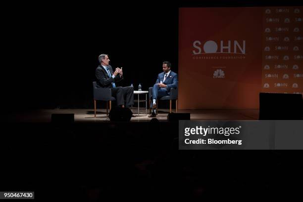 Bill Gurley, general partner of Benchmark Capital Holdings Co., left, speaks as Chamath Palihapitiya, co-founder and chief executive officer of...