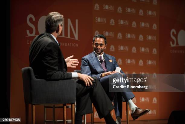 Chamath Palihapitiya, co-founder and chief executive officer of Social+Capital Partnership LLC, right, listens as Bill Gurley, general partner of...