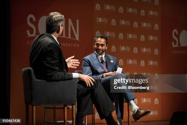 Chamath Palihapitiya, co-founder and chief executive officer of Social+Capital Partnership LLC, right, listens as Bill Gurley, general partner of...