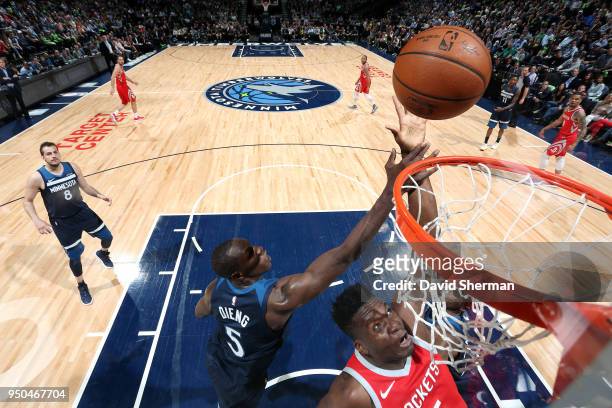 Clint Capela of the Houston Rockets and Gorgui Dieng of the Minnesota Timberwolves jump for the rebound in Game Four of Round One of the 2018 NBA...
