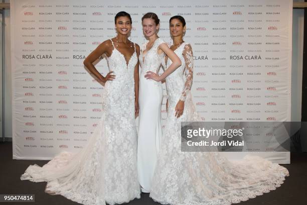 Models Daniela Braga, Matiu and Bruna Liria pose for Rosa Clara Fitting during Barcelona Bridal Fashion Week at Fira de Barcelona on April 23, 2018...