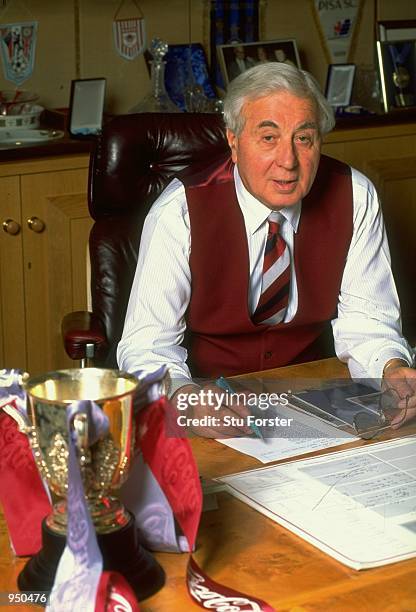 Aston Villa Chairman Doug Ellis at work in his office with the Coca Cola Cup trophy on his desk. \ Mandatory Credit: Stu Forster /Allsport