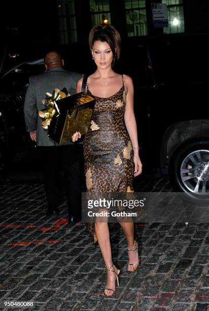 Bella Hadid brings a gift for Gigi Hadid's birthday on April 23, 2023 in New York City.