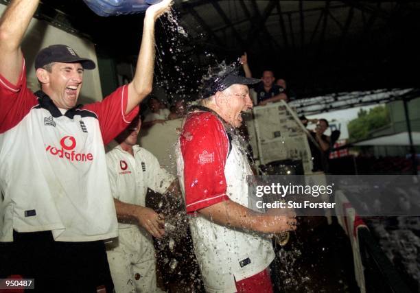 Andrew Caddick soaks England coach Duncan Fletcher after victory in the Third Test match against Sri Lanka played at the Sinhalese Sports Club Ground...