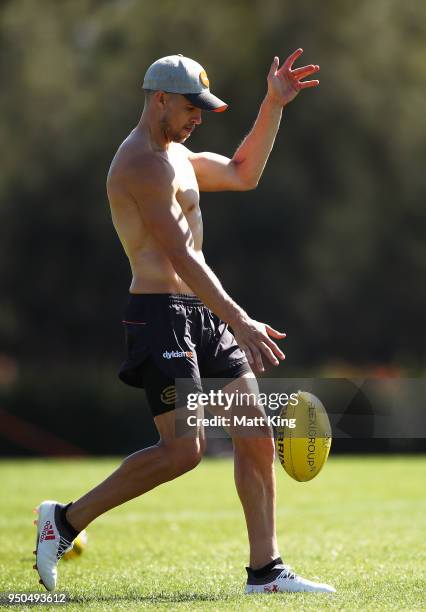 Brett Deledio of the Giants kicks during a GWS Giants Training Session at WestConnex Centre on April 24, 2018 in Sydney, Australia.