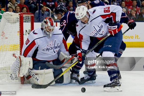 Jay Beagle of the Washington Capitals clears out the rebound after Braden Holtby of the Washington Capitals makes a save in Game Four of the Eastern...