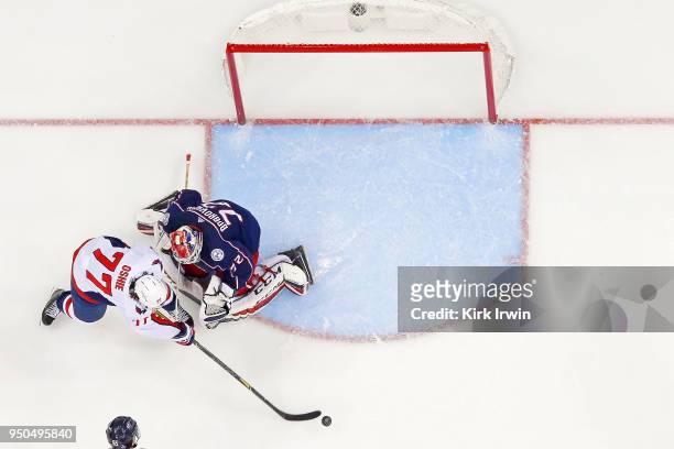 Oshie of the Washington Capitals attempts to shoot the puck past Sergei Bobrovsky of the Columbus Blue Jackets in Game Four of the Eastern Conference...