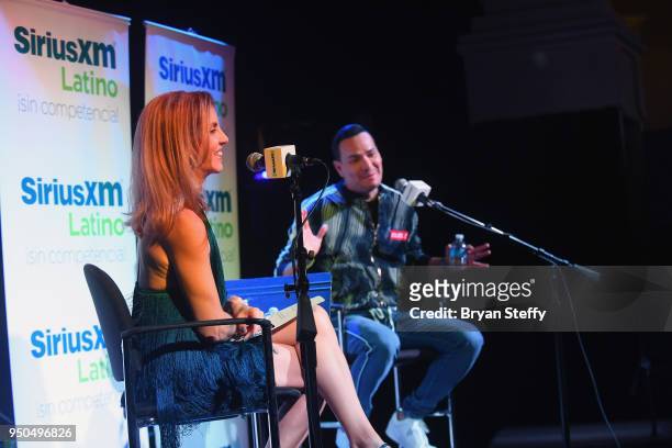 Billboard Executive Director of Content and Programming for Latin Music Leila Cobo and singer Victor Manuelle speak during a SiriusXM Town Hall at...