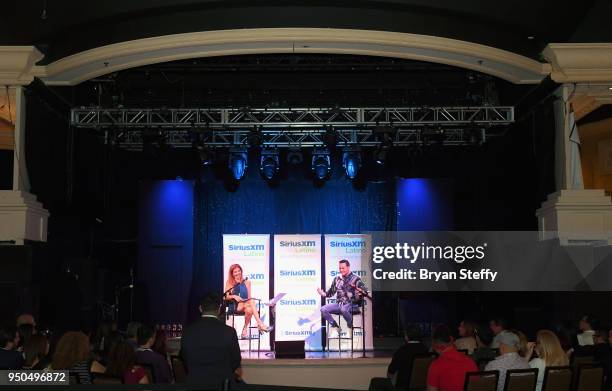 Billboard Executive Director of Content and Programming for Latin Music Leila Cobo and singer Victor Manuelle speak during a SiriusXM Town Hall at...