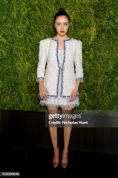 Bel Powley wears a white and blue fantasy tweed dress and coat, Look 37, from the Spring-Summer 2018 Act 2 Ready to Wear Collection with CHANEL Fine...