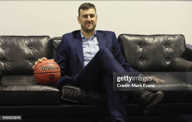 Andrew Bogut poses for photographs with a Kings singlet as he is unveiled as a Sydney Kings player at Qudos Bank Arena on April 24, 2018 in Sydney,...