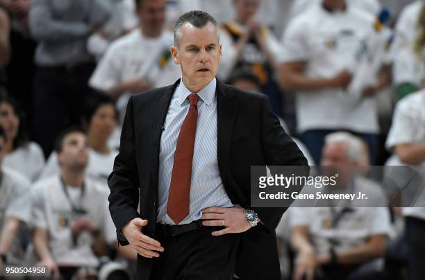 Head coach Billy Donovan of the Oklahoma City Thunder looks down court in the first half during Game Four of Round One of the 2018 NBA Playoffs...