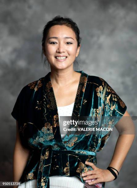 Actress Gong Li poses during the opening night of the 2018 COLCOA French Film Festival, April 23, 2018 at the Directors Guild of America Theater in...