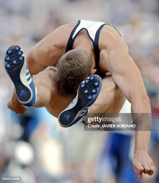 Germany's Stefan Drews competes in the decathlon long jump, 23 August 2004, during the Olympic Games athletics competitions at the Olympic Stadium in...